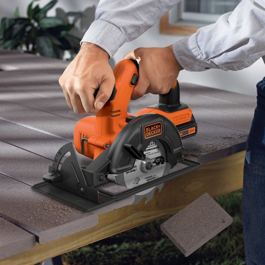 Lithium Ion 4 Tool Combo Kit being used to cut wood.