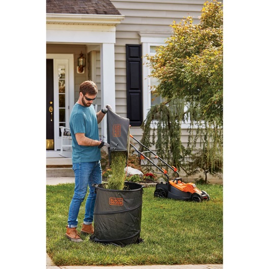 Bushel collection bag feature of Electric lawn mower with comfort grip handle.
