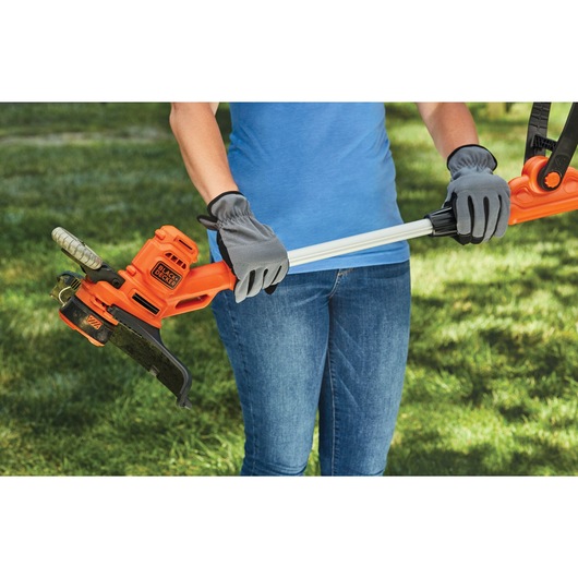 Light weight design feature in 6.5 ampere 14 inch A F S electric string trimmer or edger.