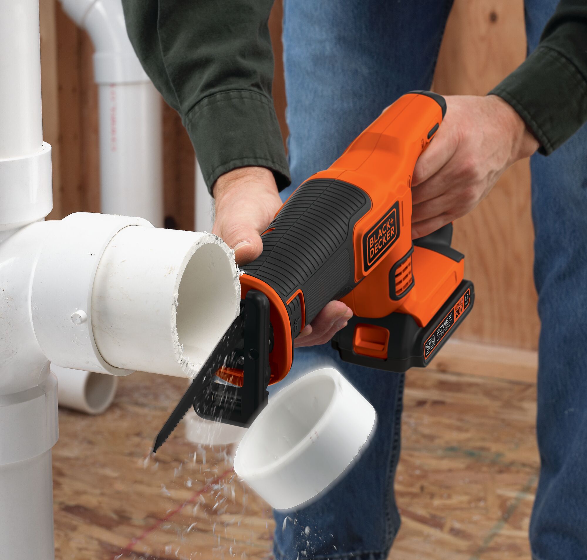 black and decker 20 volt cordless reciprocating saw kit being used.