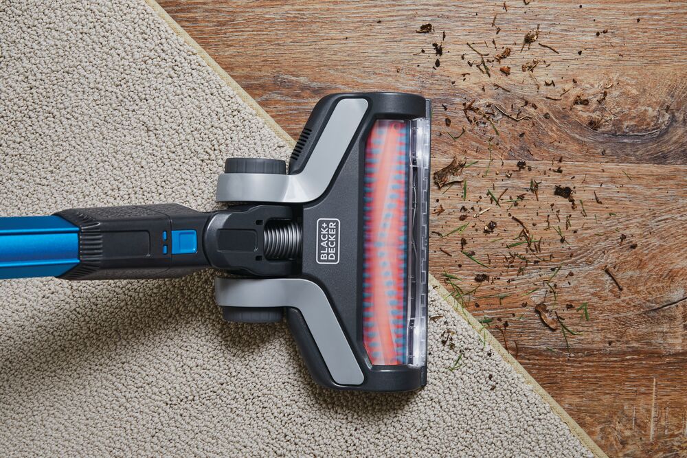 Powerseries extreme cordless stick vacuum cleaner being used to clean floor.