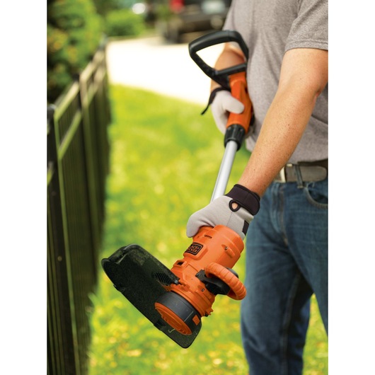 2 in 1 Trim or Edge with wheeled edge guide feature of 6.5 Amp 14 inch Trimmer Edger.