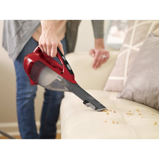 Dustbuster advanced clean cordless hand vacuum cleaning sofa.
