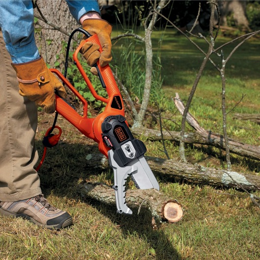 Alligator Lopper being used to cut tree branch.