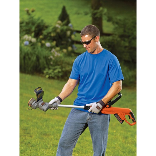 Adjustable height feature of 20 volt MAX lithium 12 inch trimmer edger.