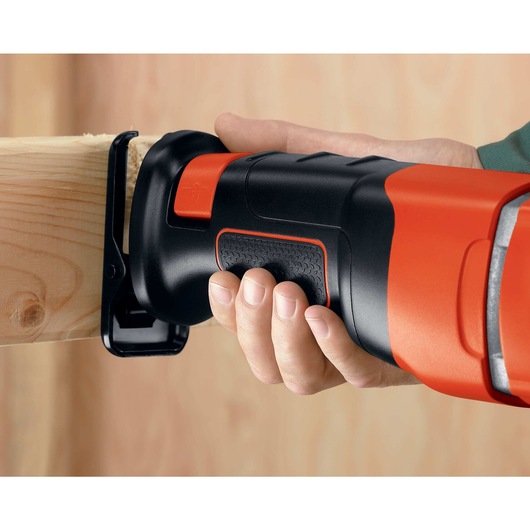 Soft grip and rear positioned handle feature of  black and decker saber saw.