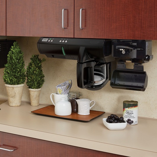 Black and decker programmable coffee maker fixed underneath a kitchen cabinet.