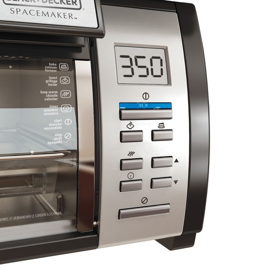 Close up of SpaceMaker Under the Cabinet 4 Slice Toaster Oven featuring a digital control panel with L E D.